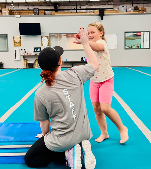 Coach working with athlete